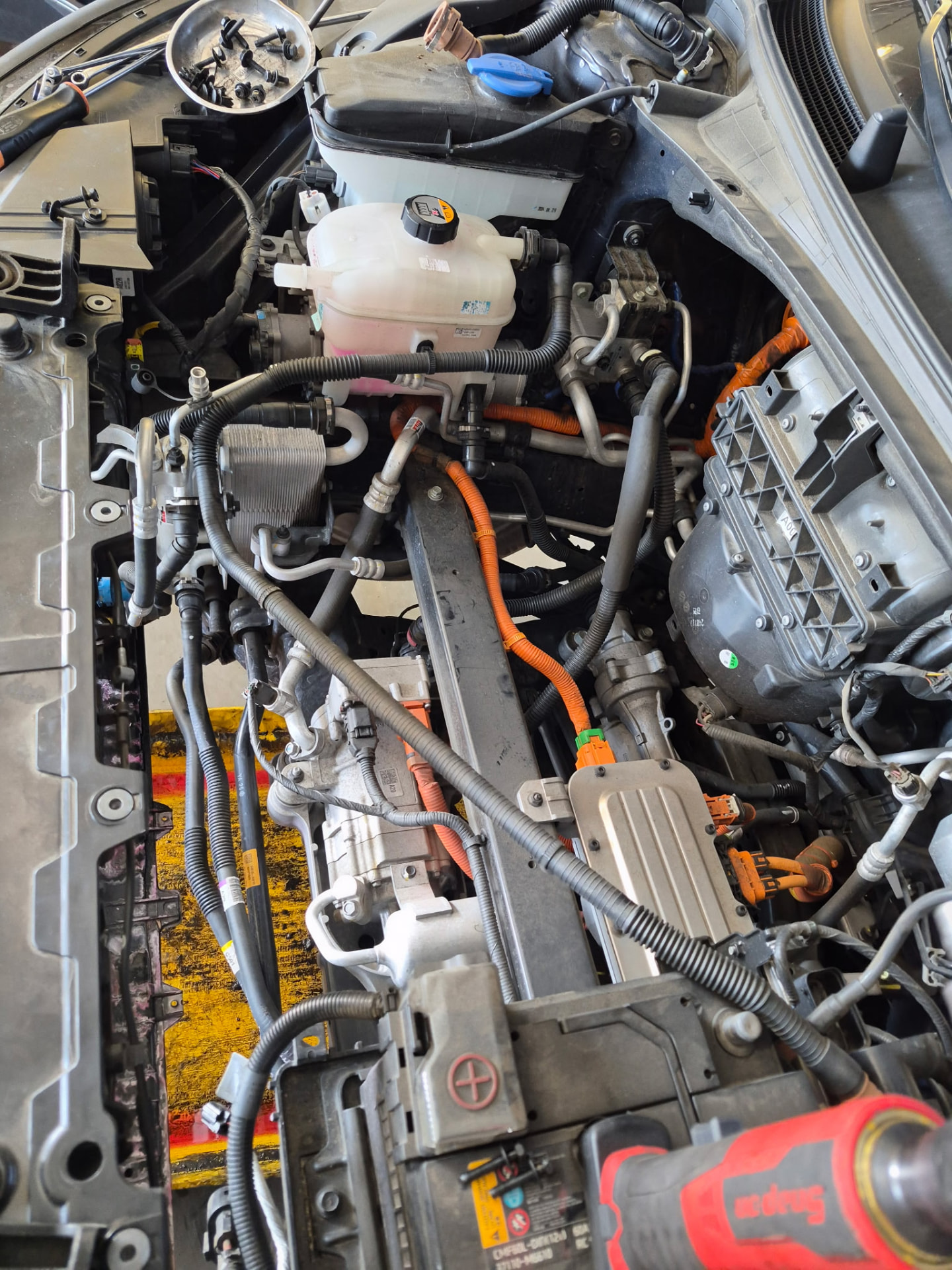 Electric vehicle cooling and high-voltage system being serviced at Rodas Auto Repair